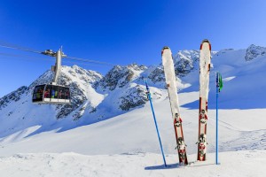 Skiing, winter season - mountains, cable car and ski equipments